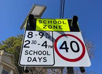 school zone sign.png