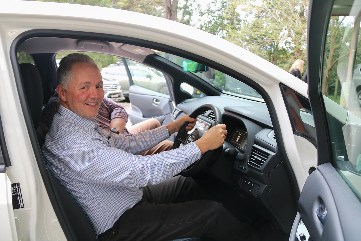 Steve in Nissan Leaf EV Fleet vehicle.jpg