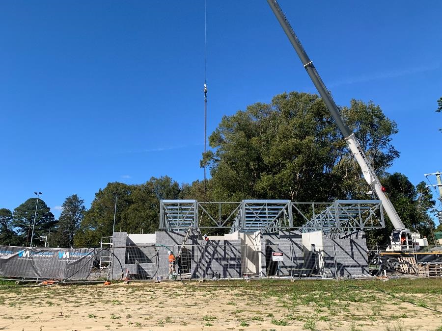 Roof work on amenities building next to the netball court