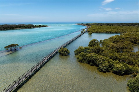 Urunga Boardwalk - Aerial shot of water front and boardwalk from the sky